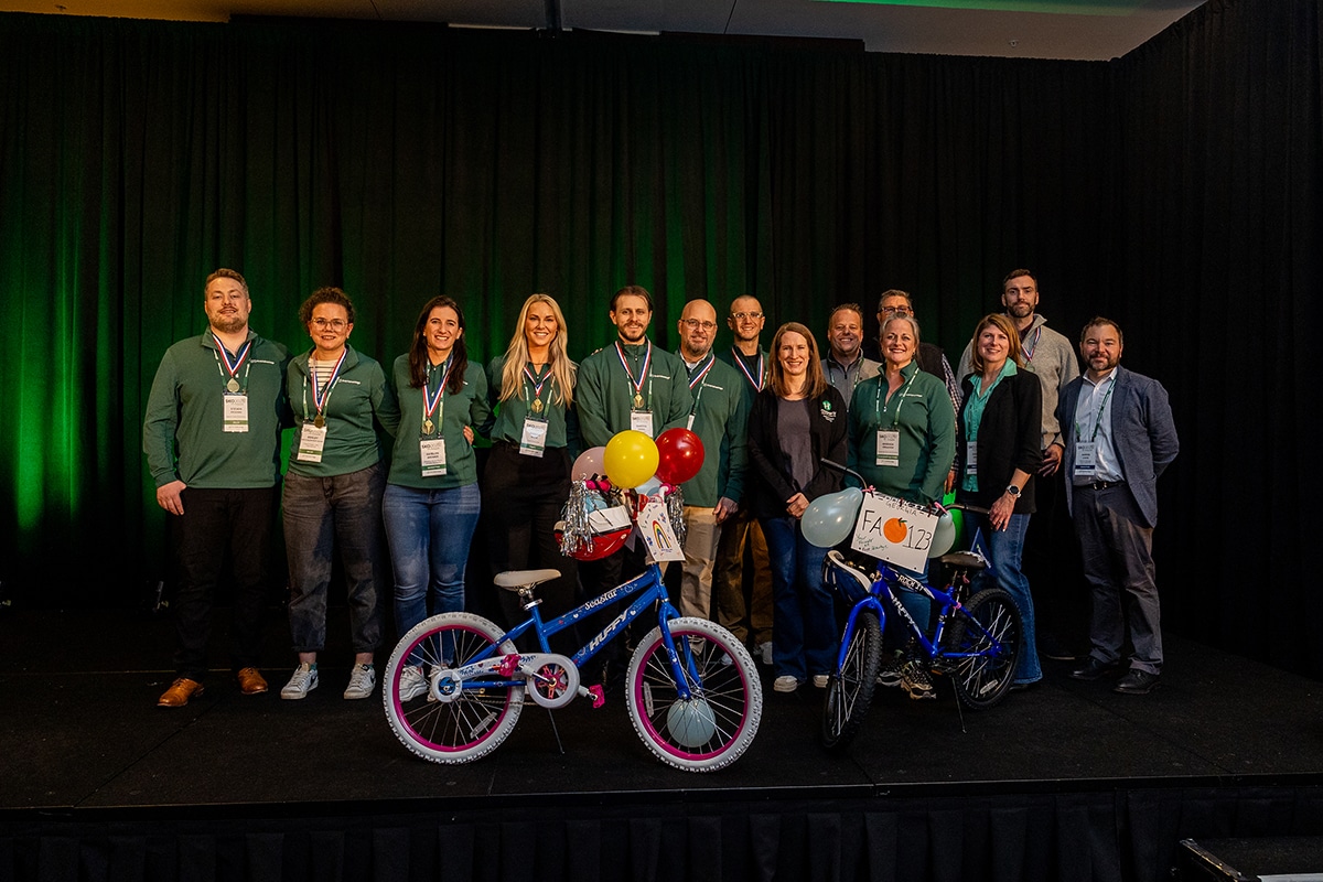 First Advantage team building bikes for Children's Healthcare of Atlanta at Sales Kickoff